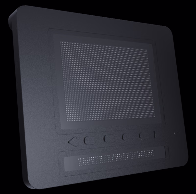 A refreshable tactile graphics display. It has an array of 40 by 60 braille pins above 6 buttons. Beneath the buttons is a standard single line braille reader. It is made of a smooth appearing material and looks similar in width and heigh to a small laptop.